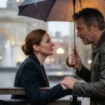 A couple holding hands in a rainy park, finding connection.